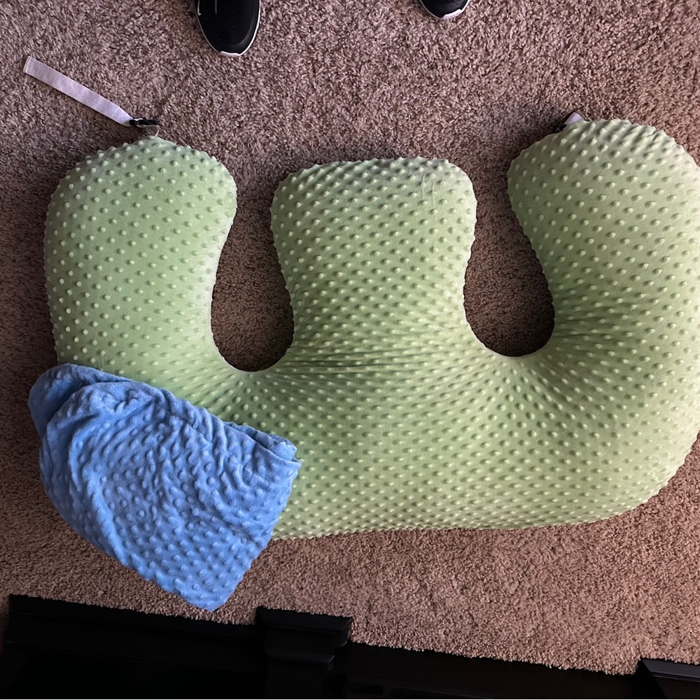 Twin Z nursing pillow with a backup cover in blue.
